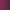 Une femme en tenue de sport rouge sourit et lève les bras sous des lumières violettes